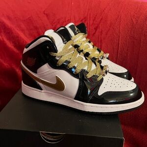 Nike Black and Gold Shoes